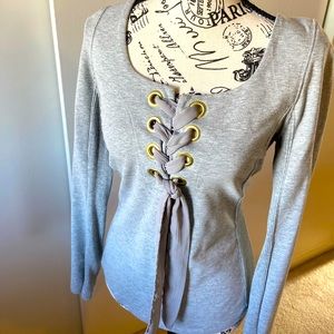 Free People Lace up front sweatshirt with ribbing on the sides and under the arm
